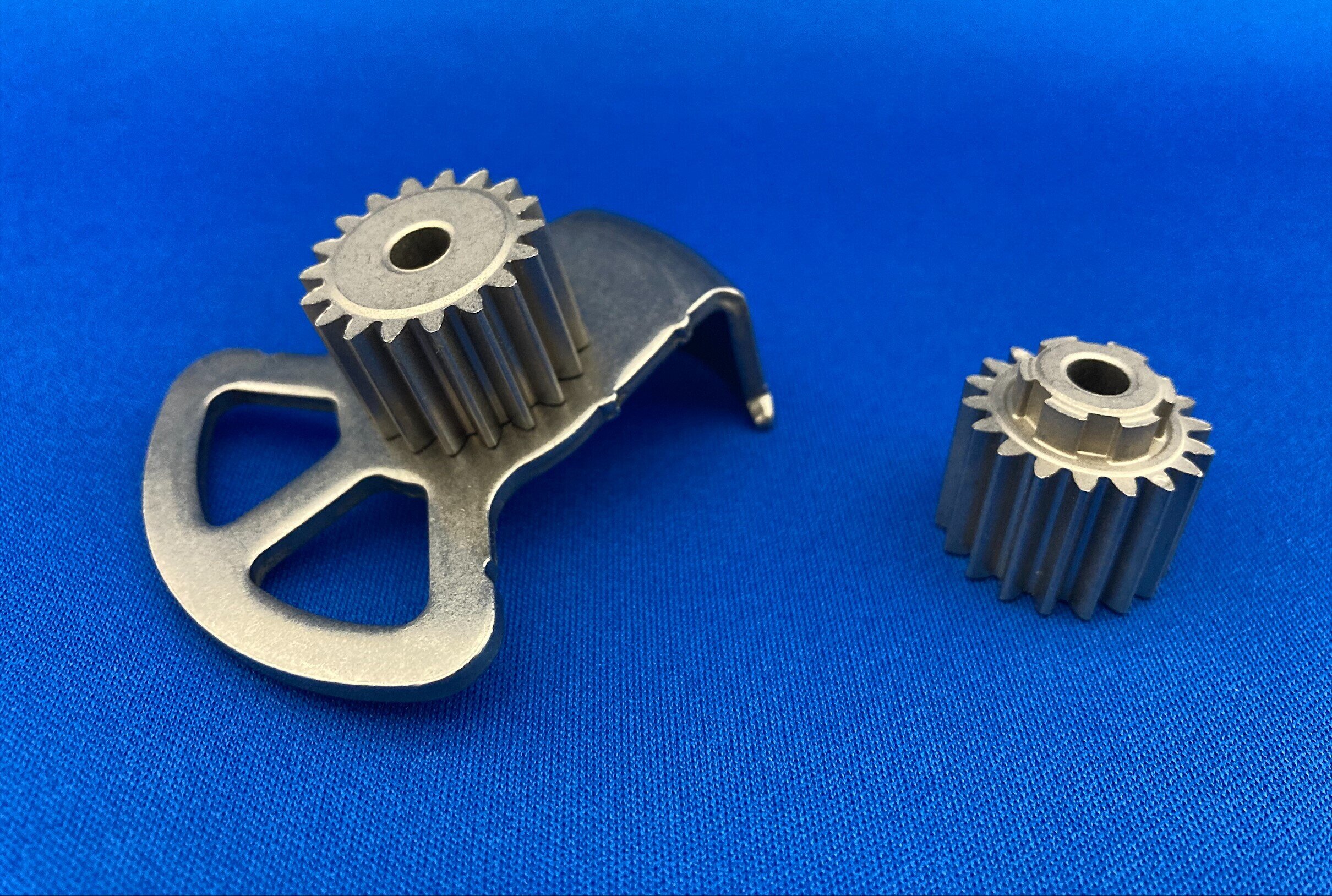 Sintered Actuator Components from the Development of Pressed Component Caulking Technology